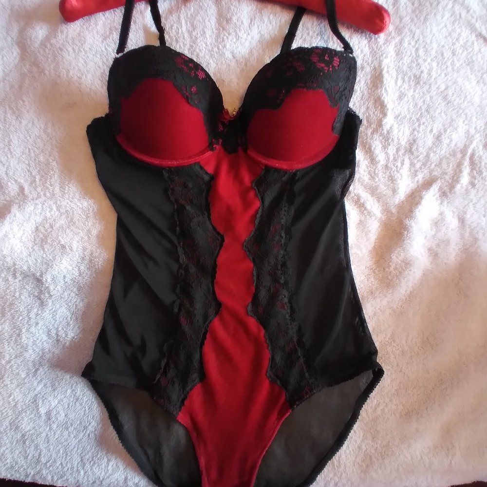 Black lace an sheer bodysuit an Red velvet snaps at crotch.Push up teddy.